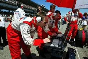 Images Dated 21st June 2004: Formula One World Championship: Toyota engineers on the grid