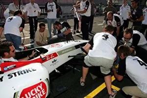 Images Dated 23rd July 2004: Formula One World Championship: The UK media team take part in a BAR pitstop challenge event
