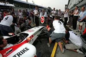 Images Dated 11th September 2004: Formula One World Championship: The UK media team take part in the final of the pitstop challenge