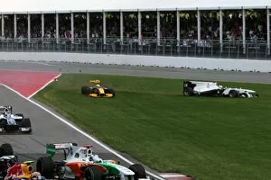 Formula One World Championship: Vitaly Petrov Renault R30 and Pedro De La Rosa BMW Sauber C29 crash at the start of