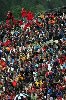 Images Dated 28th August 2004: Formula One World Championship: Wet fans