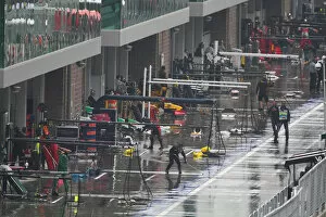 Images Dated 24th October 2010: Formula One World Championship: A wet pit lane