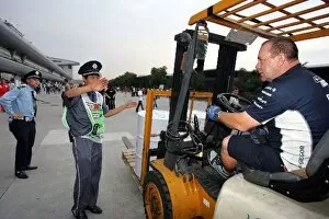 Images Dated 17th October 2008: Formula One World Championship: The Williams fuel delivery is stopped at the paddock gates