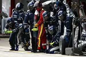 Formula One World Championship: Williams team await a pit stop