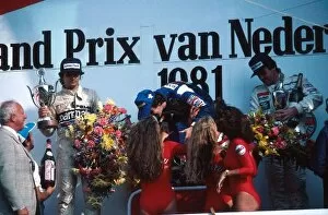 Images Dated 20th February 2006: Formula One World Championship: Winner Alain Prost Renault recieves the spoils with Nelson Piquet