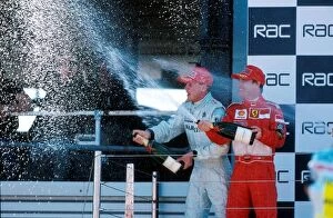 Britain Gallery: Formula One World Championship: Winner David Coulthard, left and Eddie Irvine, 2nd