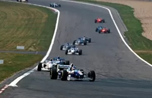 Formula One World Championship: Winner Jacques Villeneuve Williams FW19 leads