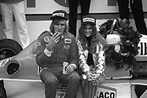 Podium Collection: Formula One World Championship: Winner James Hunt Mclaren M26, with victory spoils, cigarette