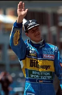 Formula One World Championship: Winner Michael Schumacher Benetton B195 salutes the crowd