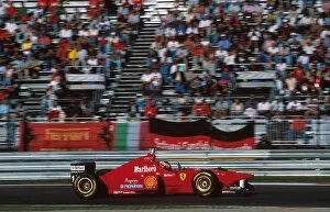 Images Dated 9th January 2001: Formula One World Championship: Winner Michael Schumacher Ferrari F310 raises his hand