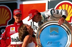 Images Dated 18th December 2000: Formula One World Championship: Winner Mika Hakkinen is congratulated by Ayrton Sennas sister