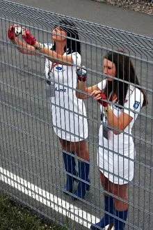 Images Dated 19th July 2008: Formula One World Championship: Women with cameras