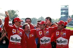 Images Dated 22nd October 2001: Formula One World Championship: World Champion Michael Schumacher, Jean Todt, Luca Badoer