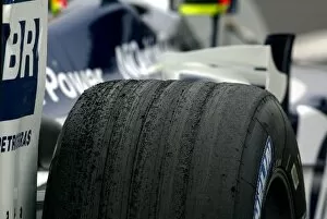 Images Dated 11th October 2003: Formula One World Championship: Worn Michelin tyres on the Williams BMW FW25 of Ralf Schumacher