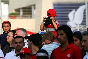 Images Dated 24th April 2009: Formula One World Championship: A young photographer