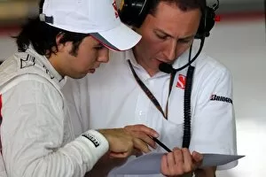 Images Dated 17th November 2010: Formula One Young Driver Test: Sergio Perez BMW Sauber talks with Paul Russell BMW Sauber Race