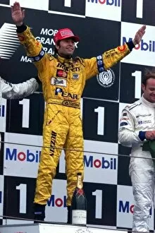 Images Dated 27th June 1999: FRENCH GRAND PRIX. 27 / 6 / 99. MAGNY-COURS, FRANCE. HEINZ-HARALD FRENTZEN CELEBRATES A FANTASTIC