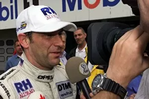 Pole Gallery: German DTM Championship: Pole position sitter Michael Bartels Mercedes is interviewed for television