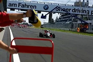 Team Picture Collection: German Formula Three Championship: Race winner Markus Winkelhock crosses the finishing line to