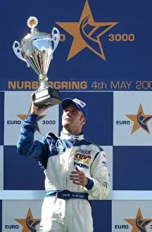 European Formula 3000 Champions Gallery: Gianmaria Bruni (ITA) ADM Motorsport celebrates his victory on the podium