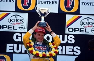 Images Dated 18th May 2001: GM Lotus Euroseries: Race winner Rubens Barrichello lifts his trophy on the podium
