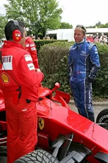 Images Dated 12th July 2008: Goodwood Festival Of Speed: Petter Solberg with a Ferrari Mechanic