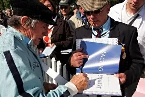 Images Dated 17th September 2005: Goodwood Revival: Sir Jackie Stewart signs autographs