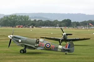 Images Dated 1st September 2006: Goodwood Revival: WWII Supermarine Spitfire aircraft taxi for take off