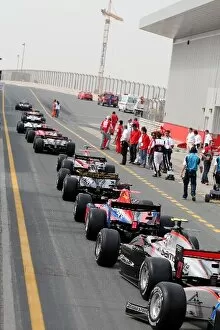 Dubai Autodrome Gallery: GP2 Asia Series: Cars line up in the pit lane