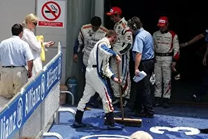 Images Dated 23rd March 2008: GP2 Asia Series: Champagne bottle is cleaned up