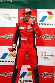 Images Dated 16th February 2008: GP2 Asia Series: Race winner Luca Filippi Qi-Meritus celebrates on the podium