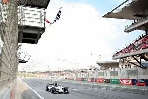 Gp2 Asia Series Gallery: GP2 Asia Series: Race winner Romain Grosjean ART Grand Prix takes the chequered flag