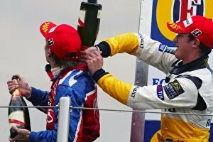 Images Dated 23rd April 2005: GP2: The podium: Race winner Heikki Kovalainen Arden International with second placed Jose Maria