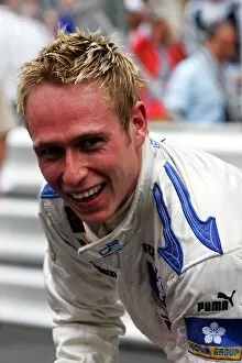 Images Dated 21st May 2005: GP2: Race winner Adam Carroll Super Nova celebrates in parc ferme