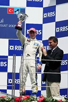 Images Dated 21st August 2005: GP2 Series: Adam Carroll Super Nova on the podium