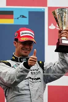 Images Dated 11th July 2009: GP2 Series: Andi Zuber FMSI celebrates his third position on the podium