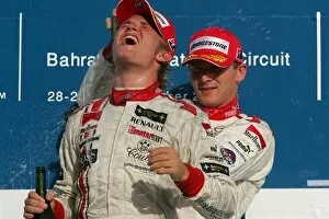 Images Dated 30th September 2005: GP2 Series: ART teammates, Nico Rosberg and Alexandre Premat on the podium for race 2