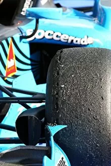 GP2 Series: Blistered Bridgestone tyres partially on the car of Alvaro Parente Ocean Racing Technology in parc ferme