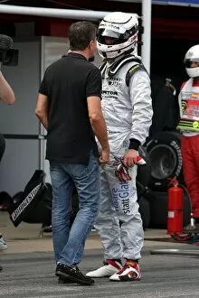Images Dated 9th May 2009: GP2 Series: Enrico Zanarini Driver Manager talks with Andi Zuber FMSI after he retired from the race