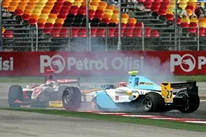 Images Dated 26th August 2007: GP2 Series: Karun Chandhok Durango is punted out of the race by Kazuki Nakajima Dams