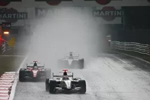 GP2 Series: Vitaly Petrov Barwa Addax Team leads behind the Safety Car at the start of the race
