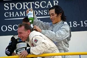 Images Dated 23rd July 2003: Hayanari Shimoda (JPN) RN Motorsports gives fellow winning co-driver Andy Wallace
