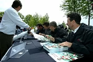Images Dated 6th May 2003: Indy Racing League: Andretti Green Racing drivers sign autographs for the fans
