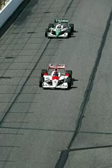 Images Dated 11th August 2003: Indy Racing League: Race winner Helio Castroneves Penske Racing G-Force Toyota leads Tony Kanaan