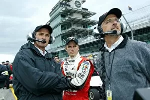 Images Dated 12th May 2003: Indy Racing League: Rookie Dan Wheldon Andretti Green Racing Dallara Honda watches qualifying with