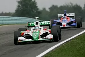 Images Dated 25th September 2005: Indy Racing League: Tony Kanaan leads Dario Franchitti in the Watkins Glen Indy Grand Prix