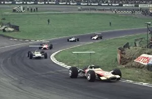 Images Dated 3rd June 2021: Jackie Oliver leads Siffert, Amon, Stewart and Surtees British Grand Prix