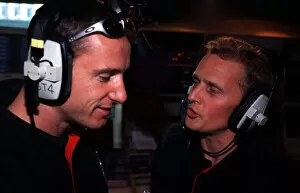 Jaguar at Capital FM. London, England. 19th April 2000. Johnny Herbert and Eddie Irvine visit the set of Radio station