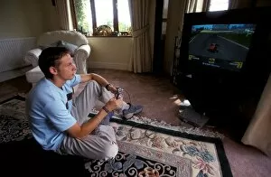 Lifestyle Gallery: Jenson Button Lifestyle: Jenson Button relaxes by playing on a Playstation
