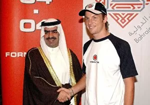 Images Dated 6th November 2003: Jenson Button Visits Bahrain: Jenson Button, BAR Honda, right